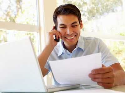 Filipino man working at home